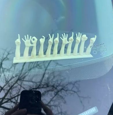 Magnetic gesture parking license plate with adhesive