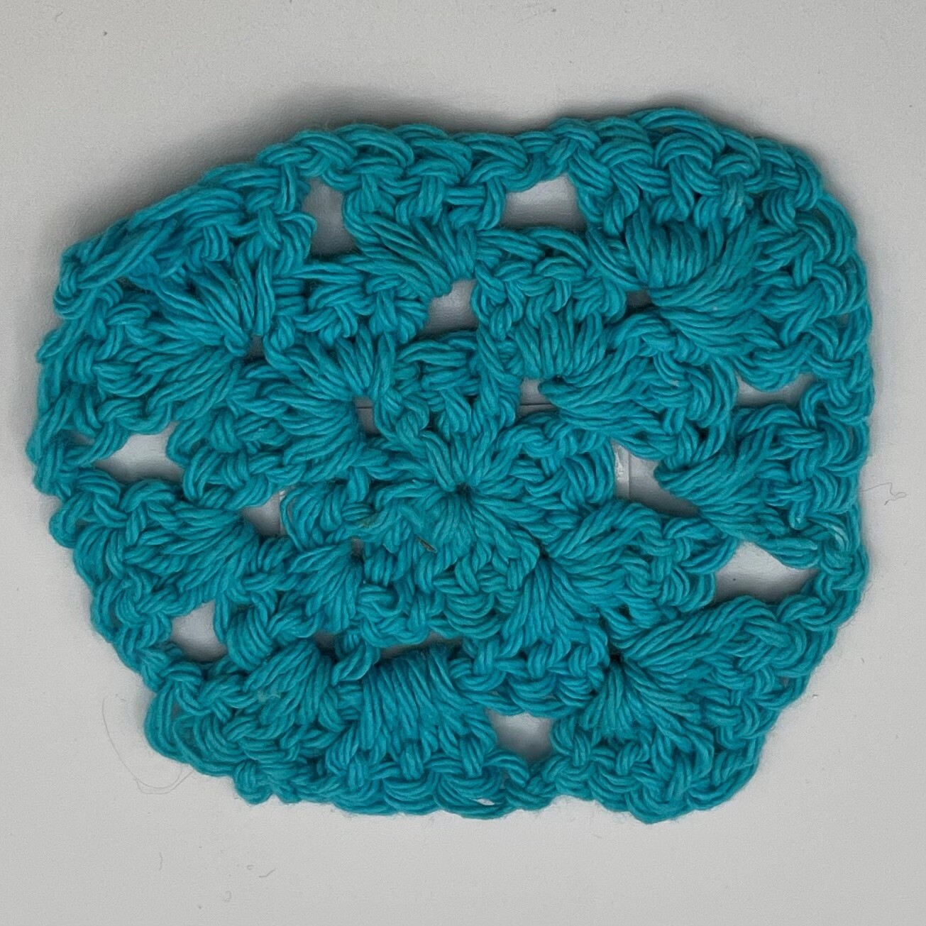 Kathryn Feldmann, Vibrant blue crochet coaster