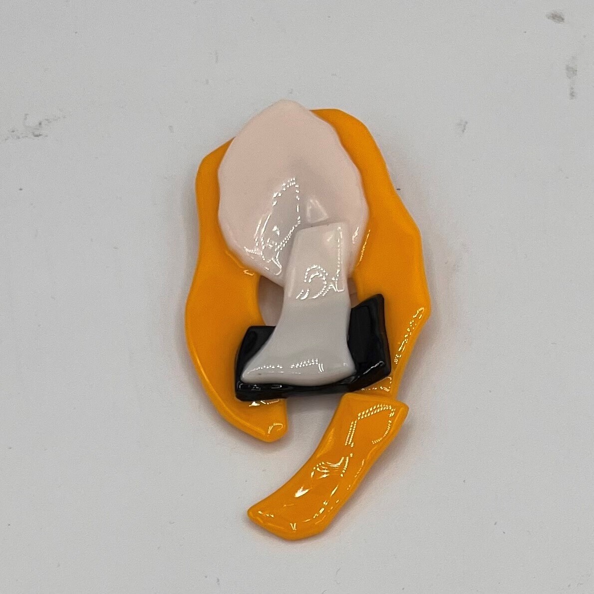 Mallory Miller, Blonde witch glass magnet