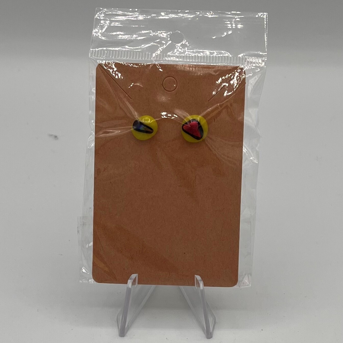 Alphonso Rowe, Green designed glass earrings