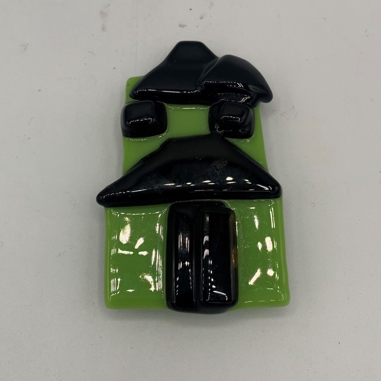Mary Phifer, Haunted house glass magnet