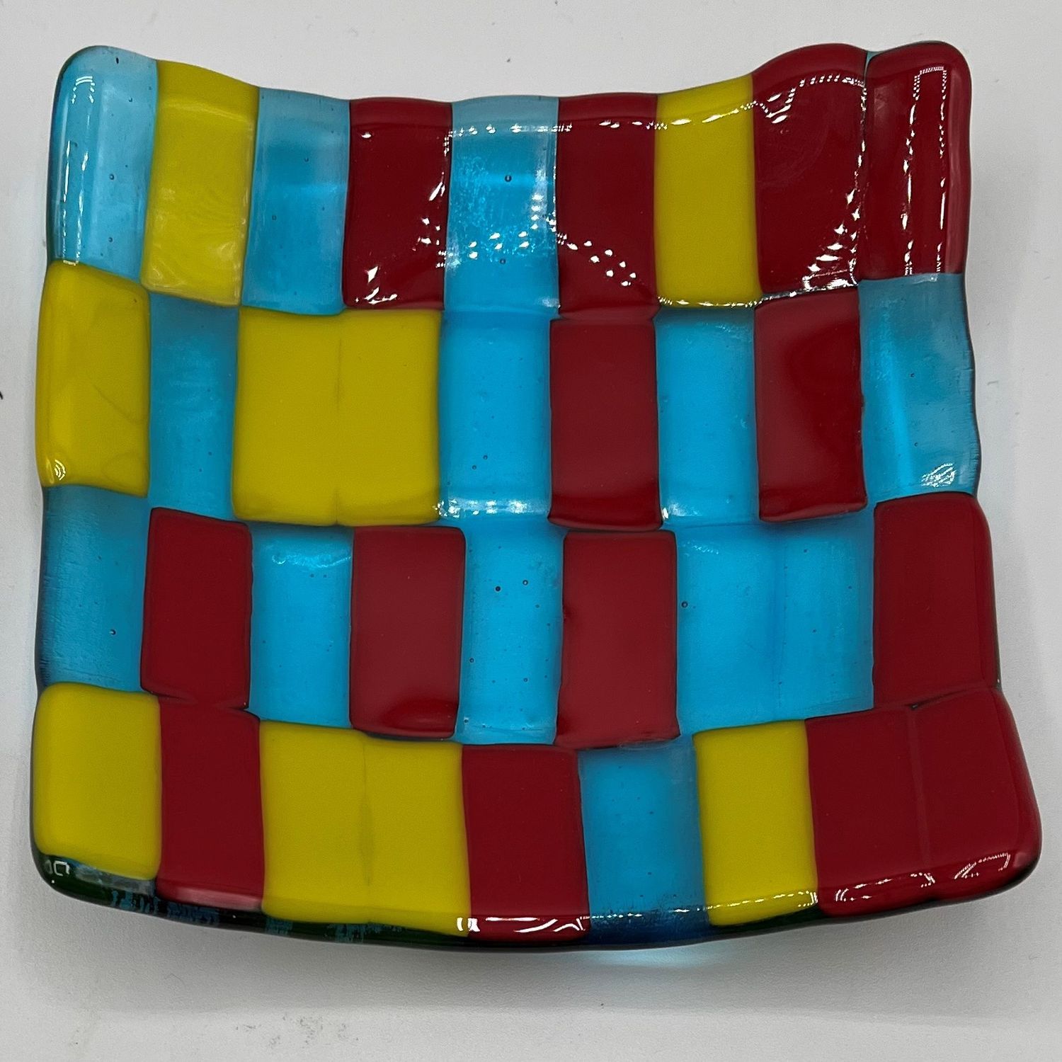 Alphonso Rowe, Red and green and blue designed glass dish