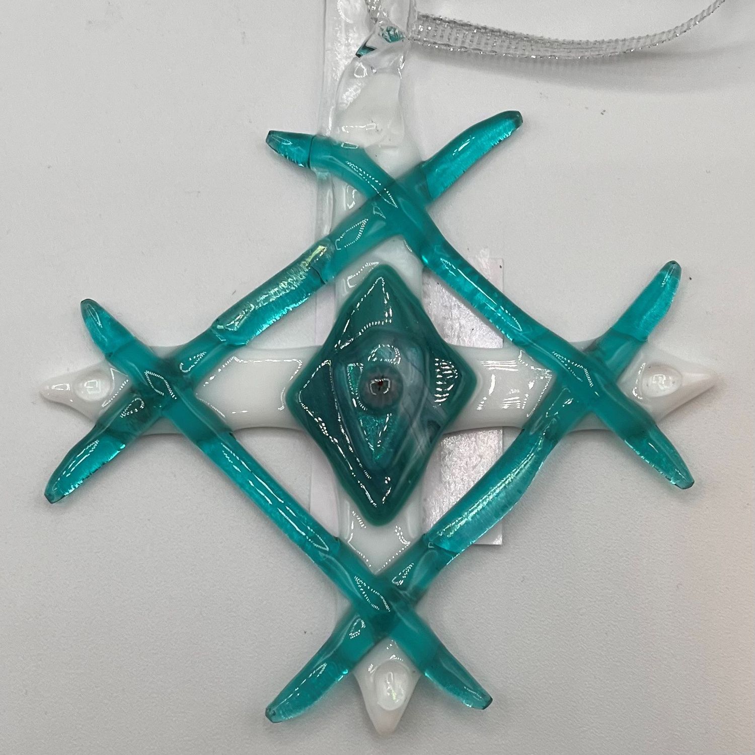 Liz Pfeiffer, Teal and white glass ornament