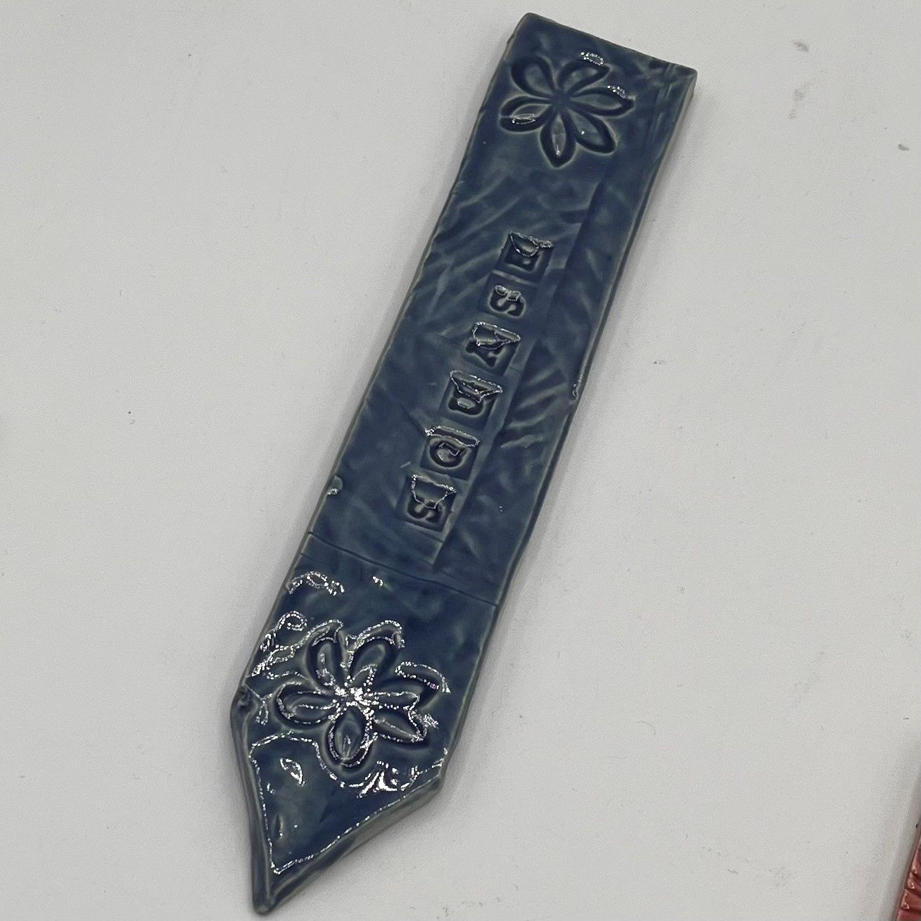 Mallory Miller, Ceramic Garden Stake, Squash on Blue Floral Background