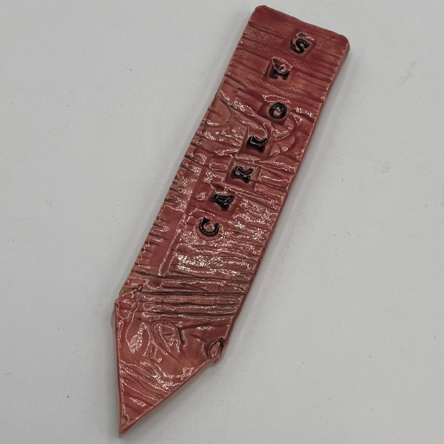 Annie Baxter, Ceramic Garden Stake, Carrots on Red Background