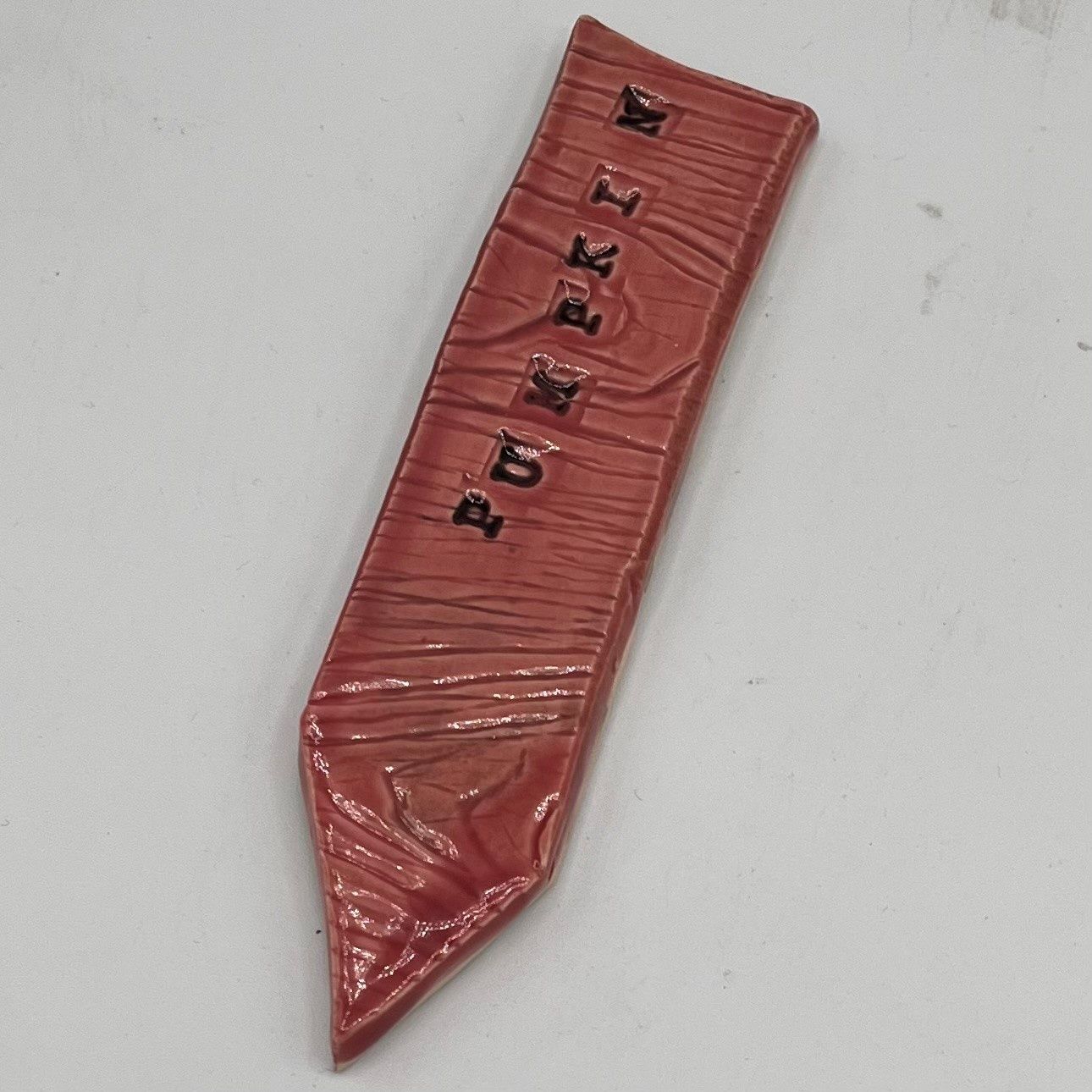 Annie Baxter, Ceramic Garden Stake, Pumpkin on Red Background