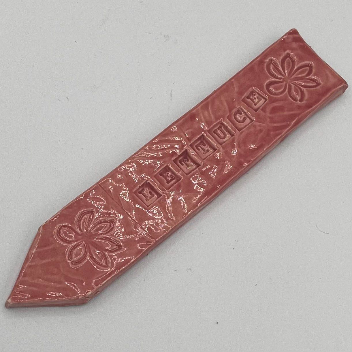 Mallory Miller, Ceramic Garden Stake, Lettuce on Soft Red Background