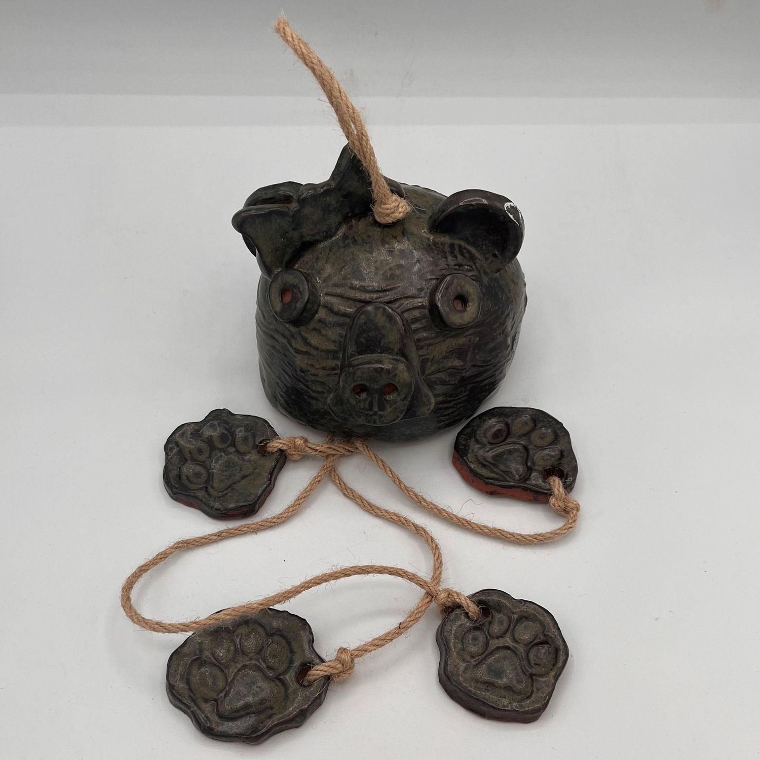 Studio, Ceramic Wall Hanging, Dark Bear with Bow