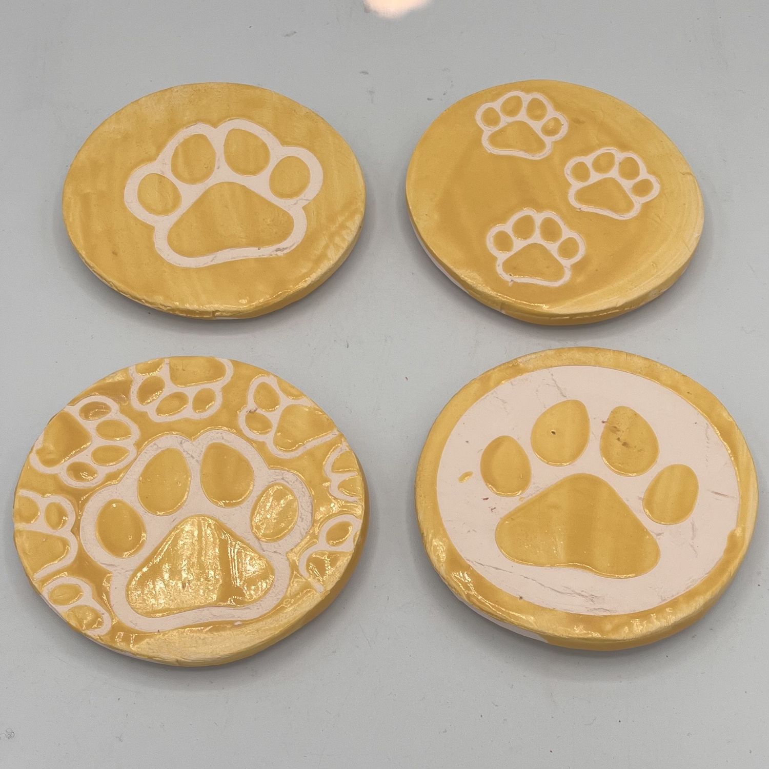 Tammy McCammon, Ceramic Coaster Set, Yellow Paws