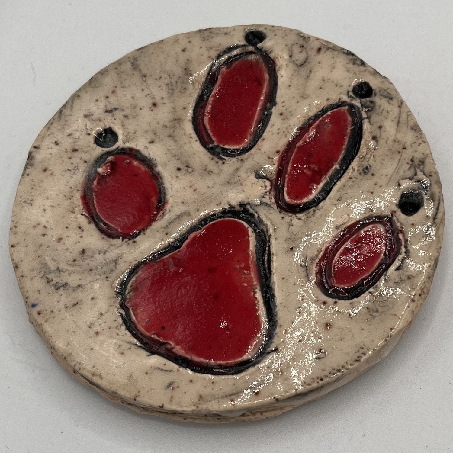 Alphonso Rowe, Ceramic Coaster, Red and Black Pawprint