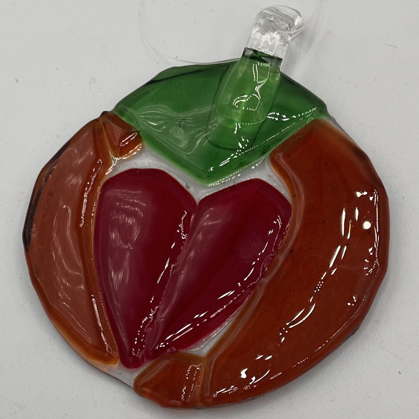 Jody Mann, Fused Glass Suncatcher, Red Heart on Orange and Green Background