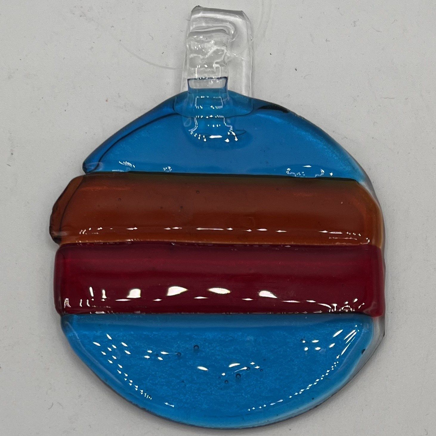 Lori Lefferts, Fused Glass Suncatcher, Red, Orange and Blue Design