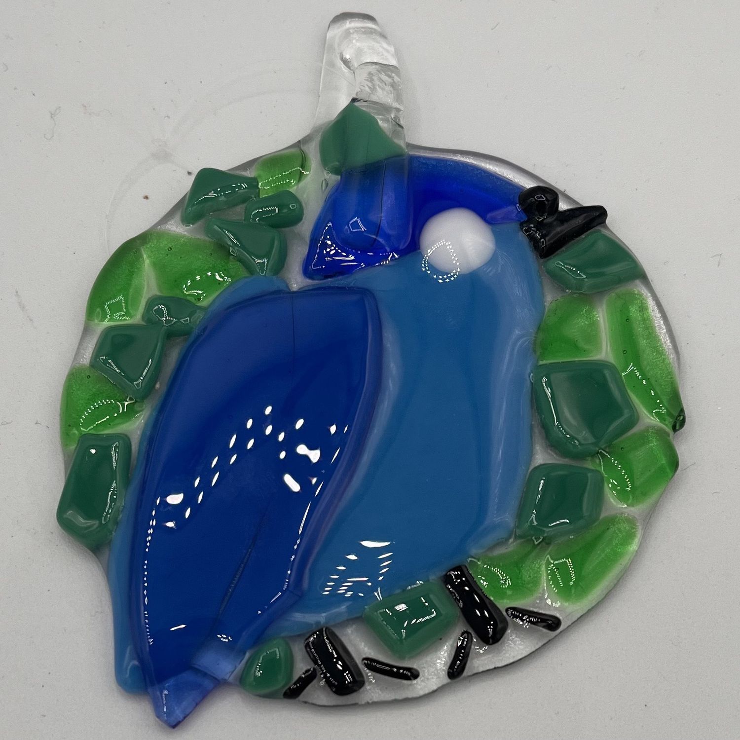 Andrea Walker, Fused Glass Suncatcher, Blue Bird on Green Background