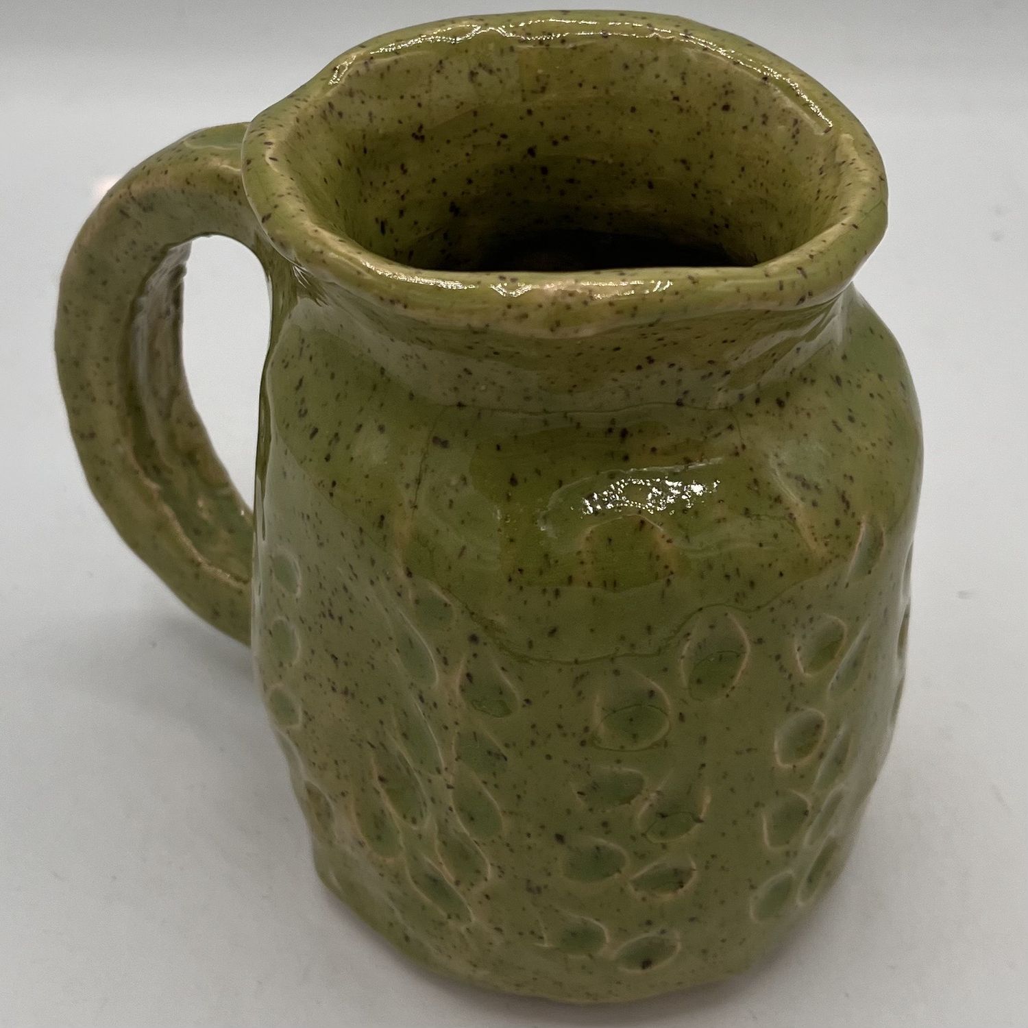 Kara Burgdorf, Ceramic Mug, Speckled Leafy Green Design