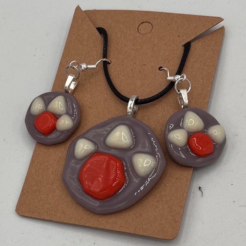 Alphonso Rowe, Fused Glass jewelry Set, Orange and White Shapes on Purple Background