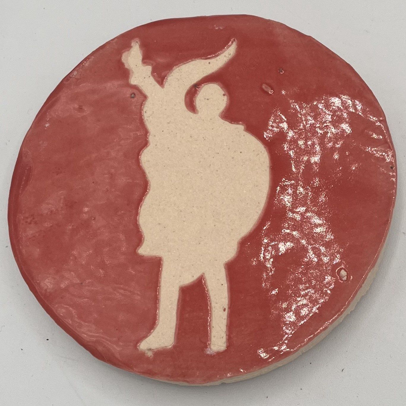 Joey Buschelman, Ceramic Coaster, White Statue on Red