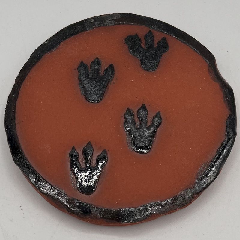Nathan Strother, Ceramic Coaster, Black Footsteps on Brown