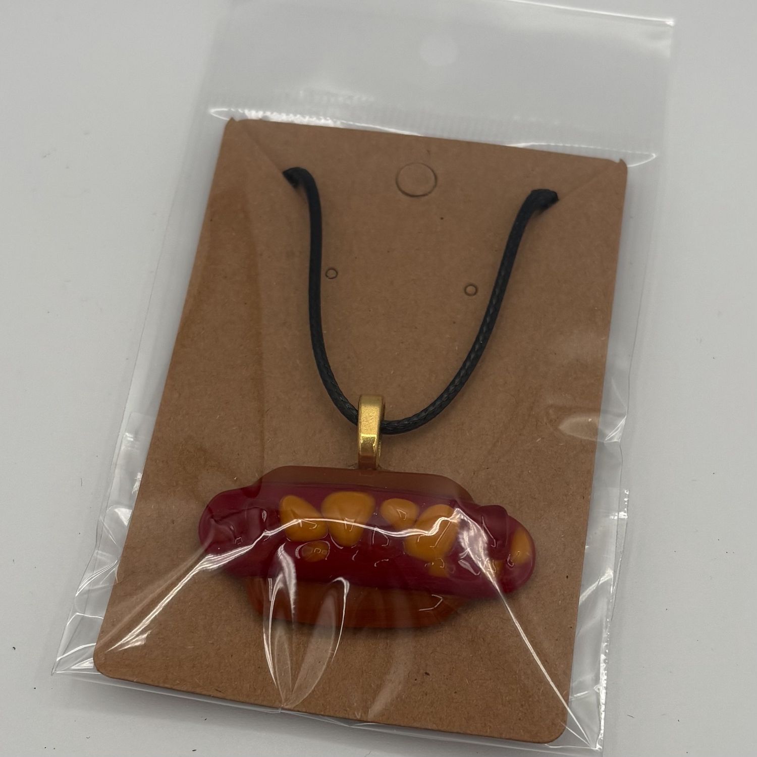 Nathan Strother, Fused Glass Pendant, Hot Dog