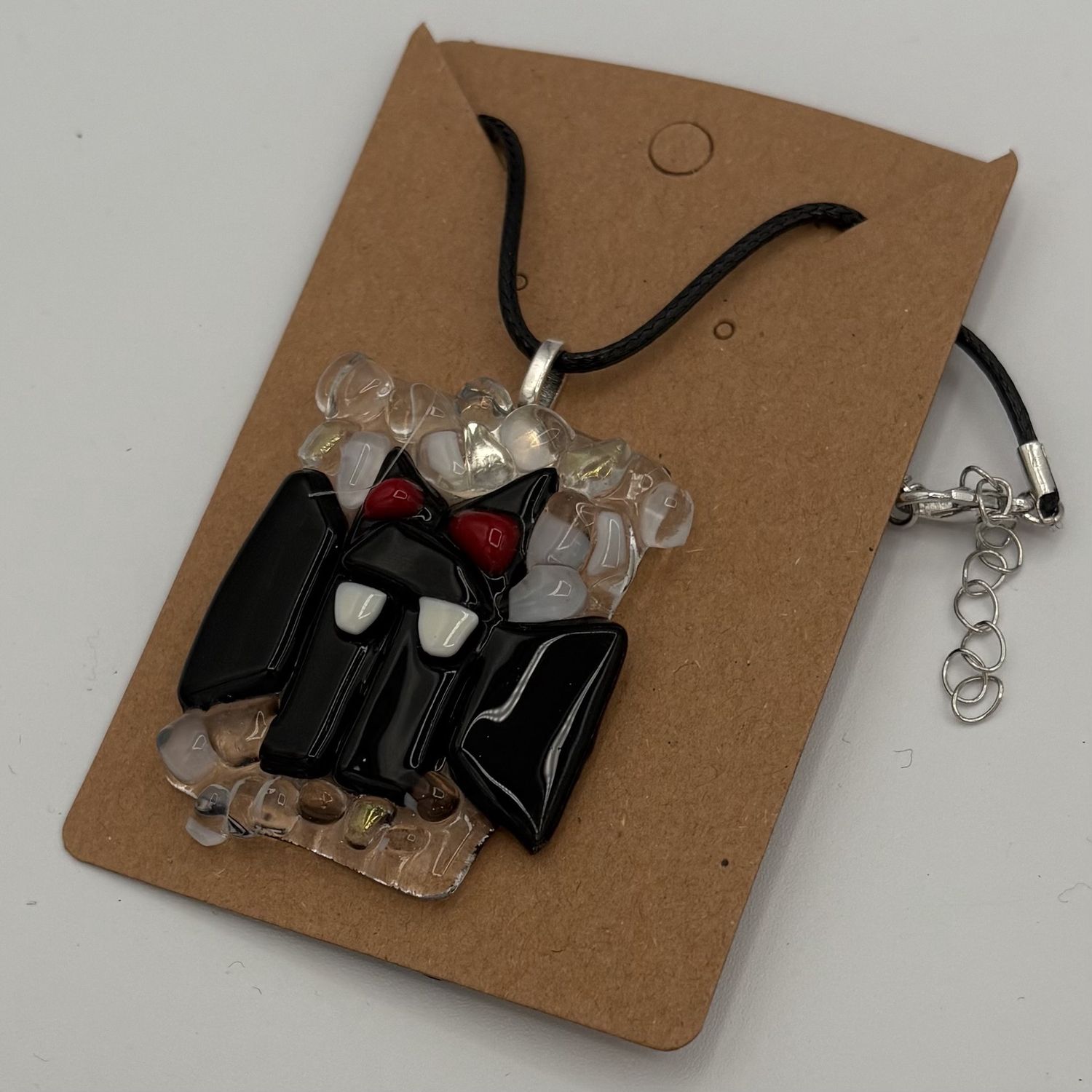 Jordan Satterfield, Fused Glass Pendant, Red-Eyed Bat