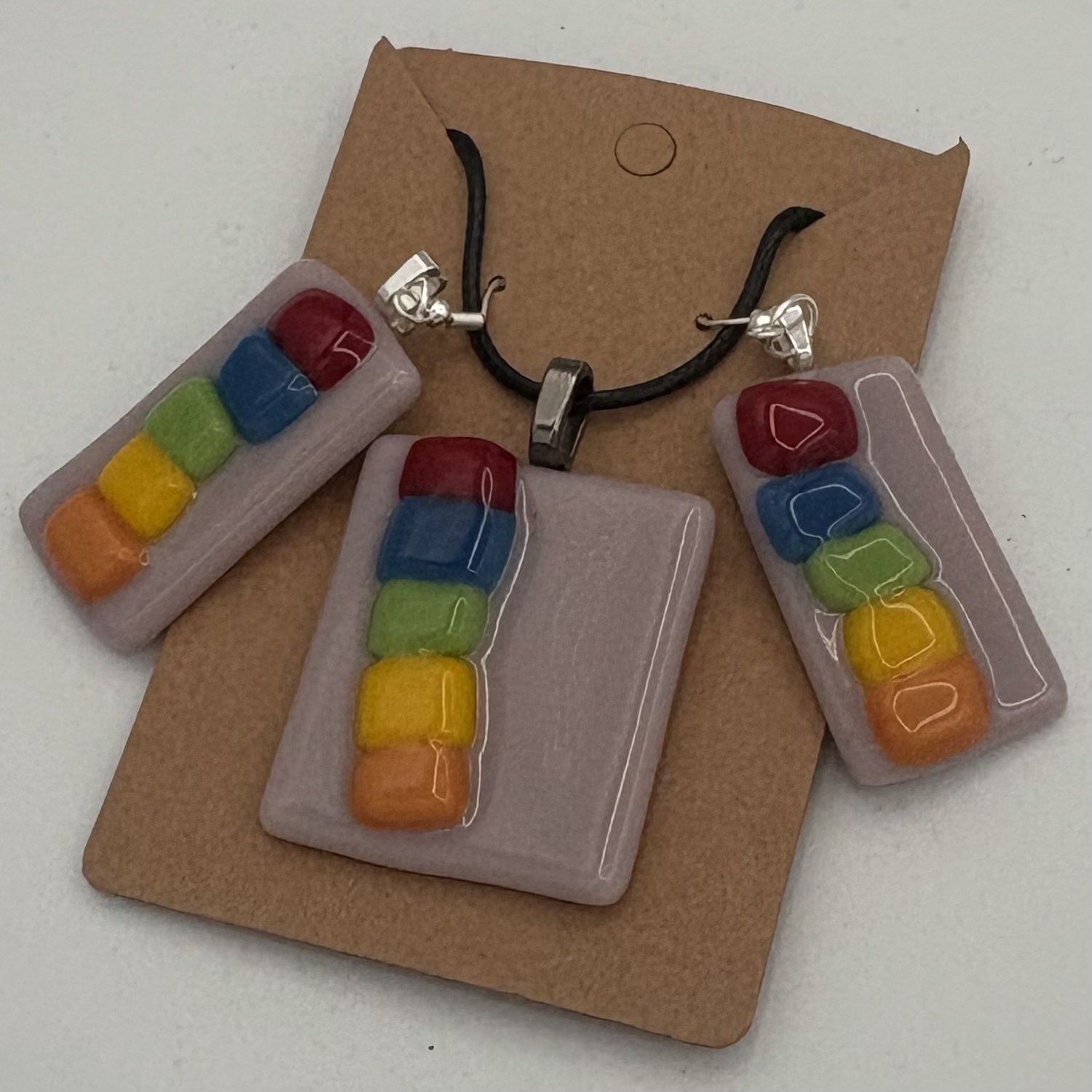 Meredith Bokeno, Fused Glass Jewelry Set, Rainbow Squares on Purple Background