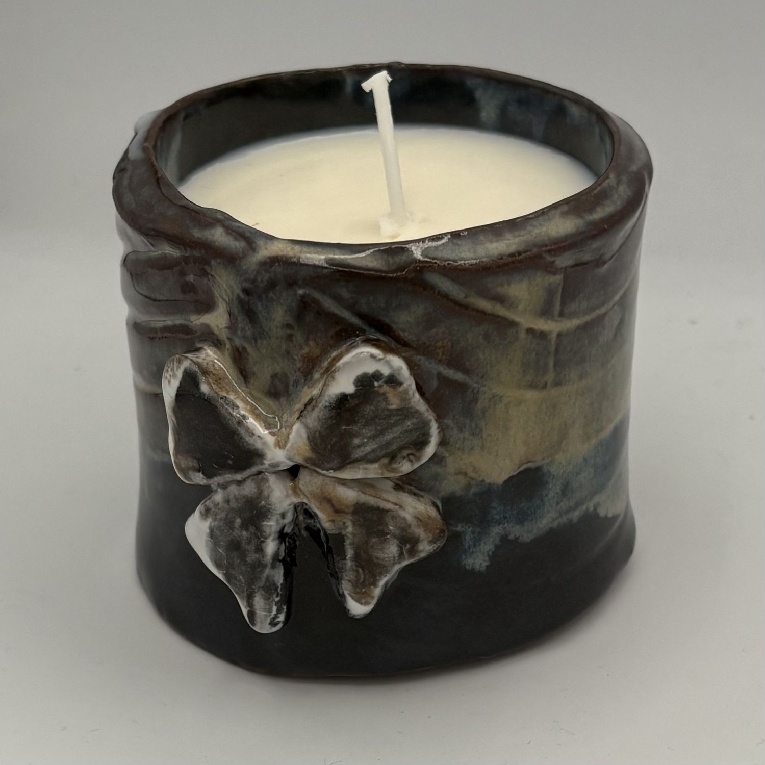 Tammy McCammon, Ceramic Candle, Bow on Dark Background