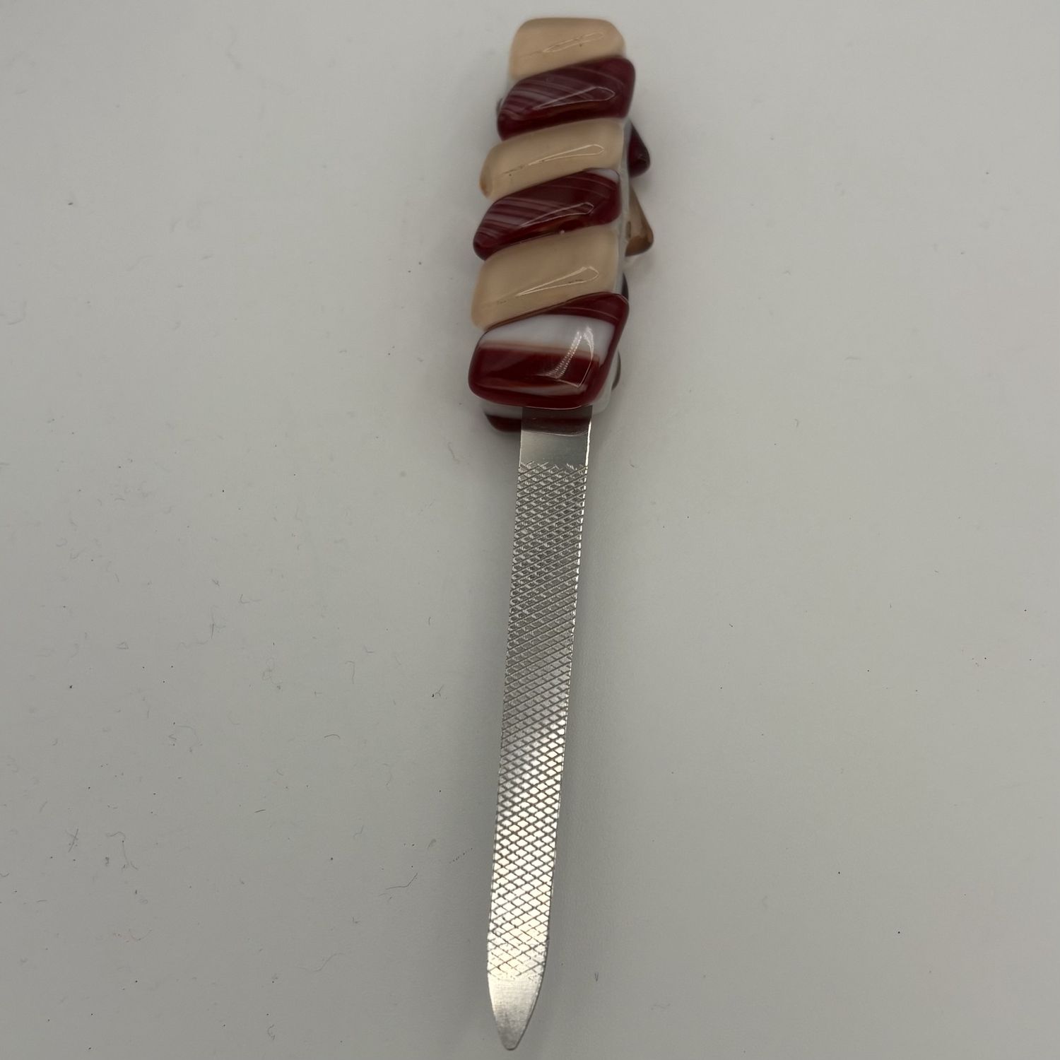 Gabby Adams-Hubbard, Nail File, Pink and Streaky Red Stripes