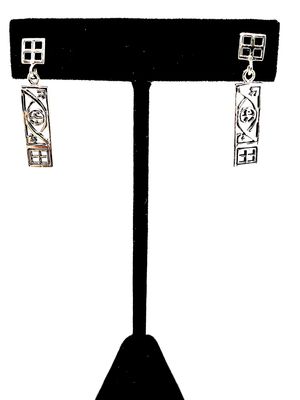 Sterling silver light to medium weight, medium length rectangular earrings based on the architectural designs of Charles Rennie MacIntosh. Each piece sits on a stud structured like the well known “window” which is also apparent at the bottom of the piece. Sitting in the middle, sits perfectly placed the famous Glasgow Rose, encompassed by stems stems on either side, one ascending, one descending, featuring a small Leaf.