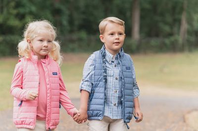 Girl's Puffer Vest in Plumeria Pink with Sea Turtle Print Liner