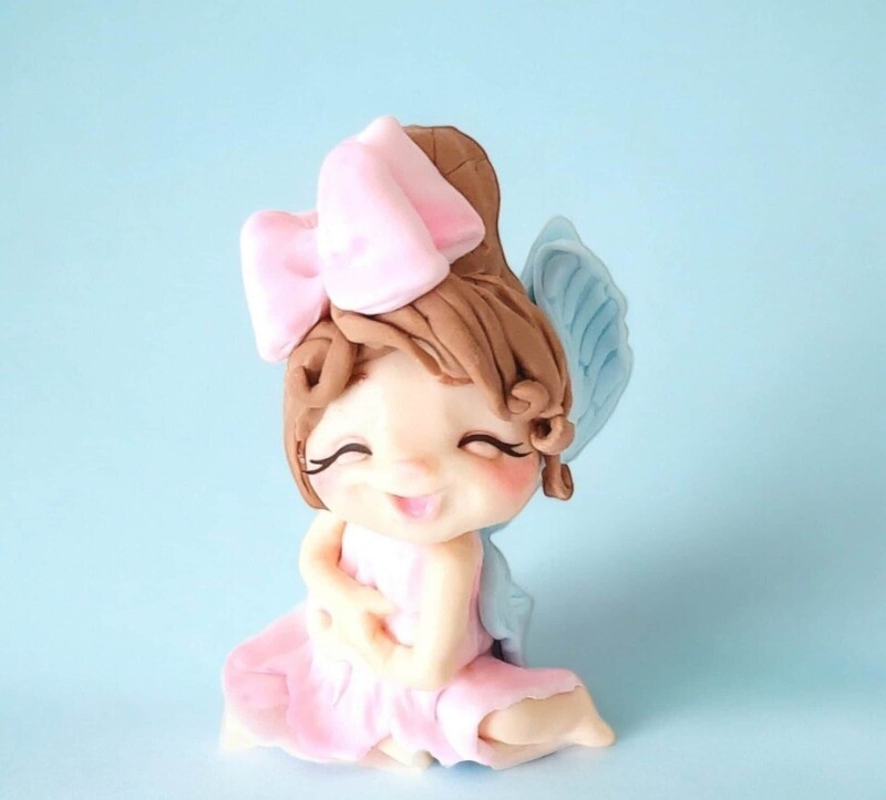 Baby Fairy with bun brown hair Cake Decorations.