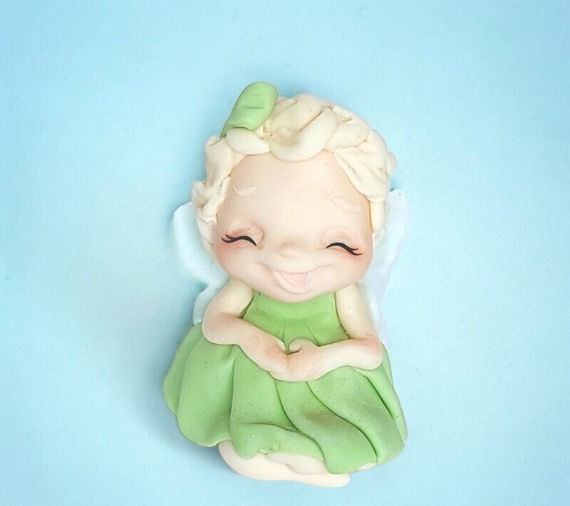 Baby fairy blond hair, cake decorations.