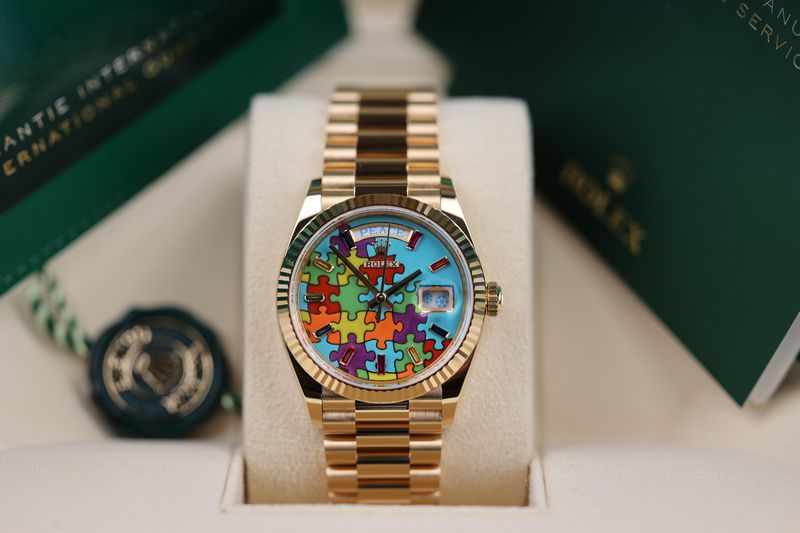 Rolex Day Date 36 Gelbgold "Puzzle" Dial - 2025