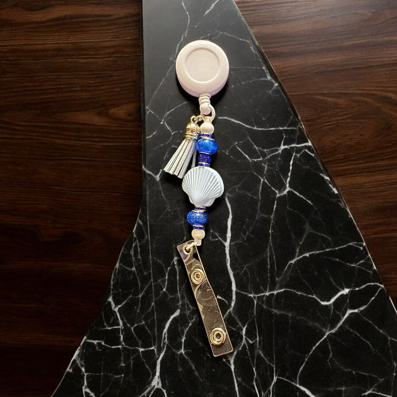 Seashell is badge holder