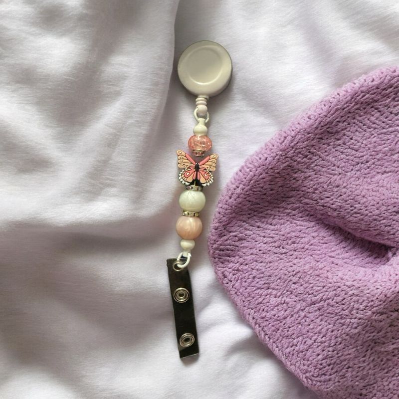 Butterfly badge holder
