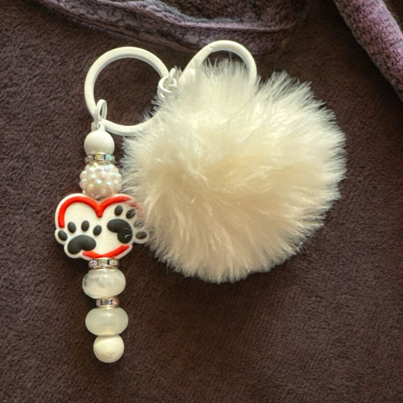 Black and white paws with poof keychain