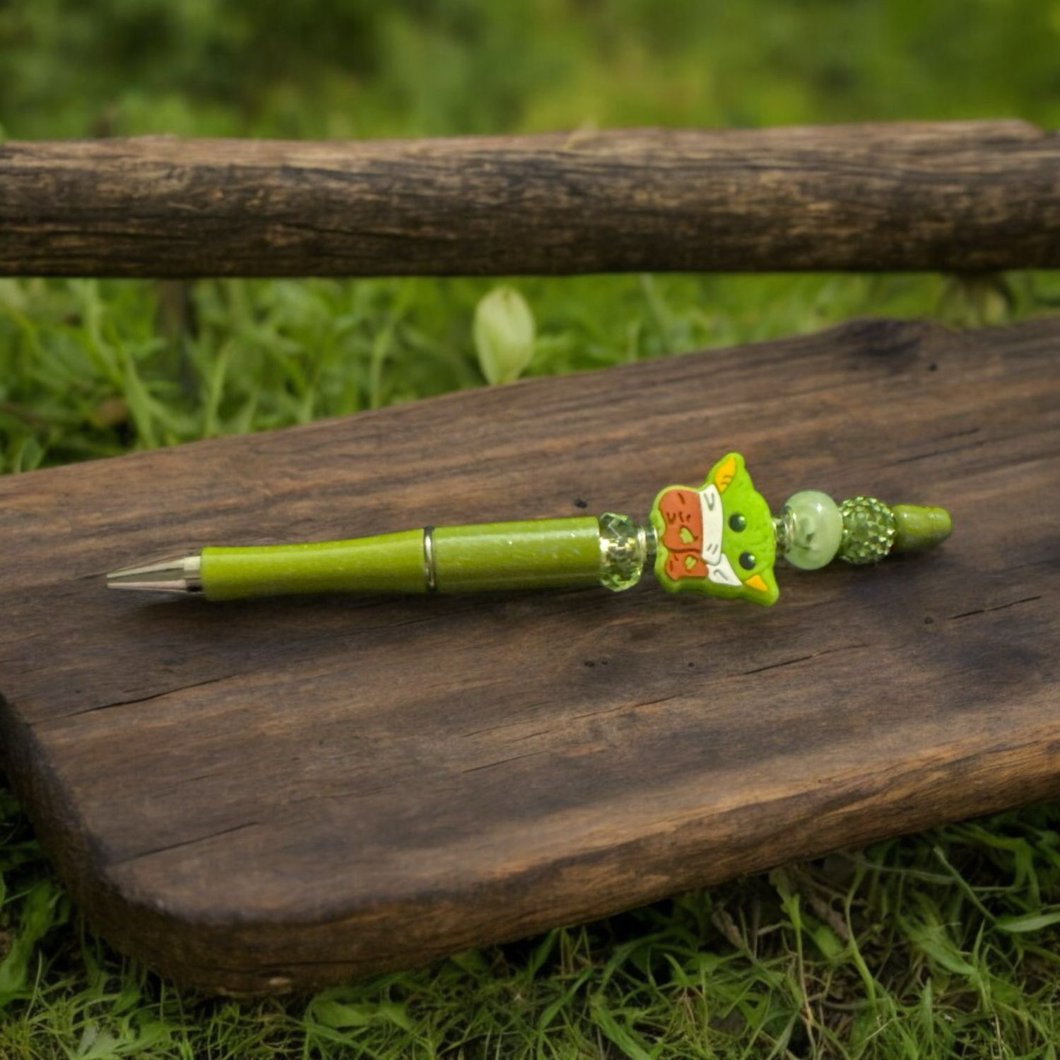 Green baby alien beaded pen