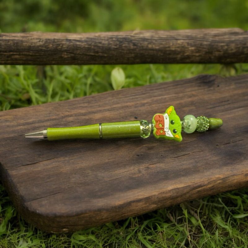Green baby alien beaded pen