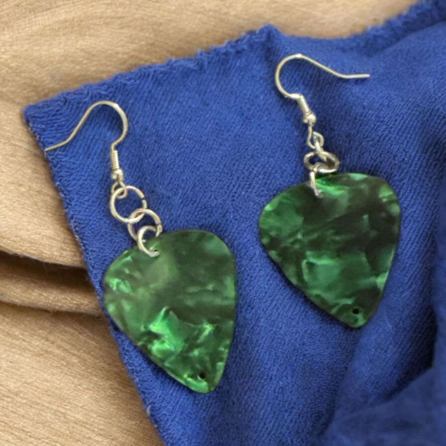 Green guitar pick earrings