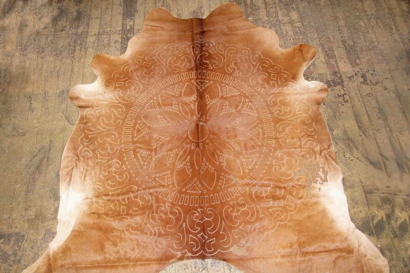 COW HIDE RUG WITH ASSORTED LASER CUT DESIGNS ECOLEATHER 43ft2 AVERAGE 12899