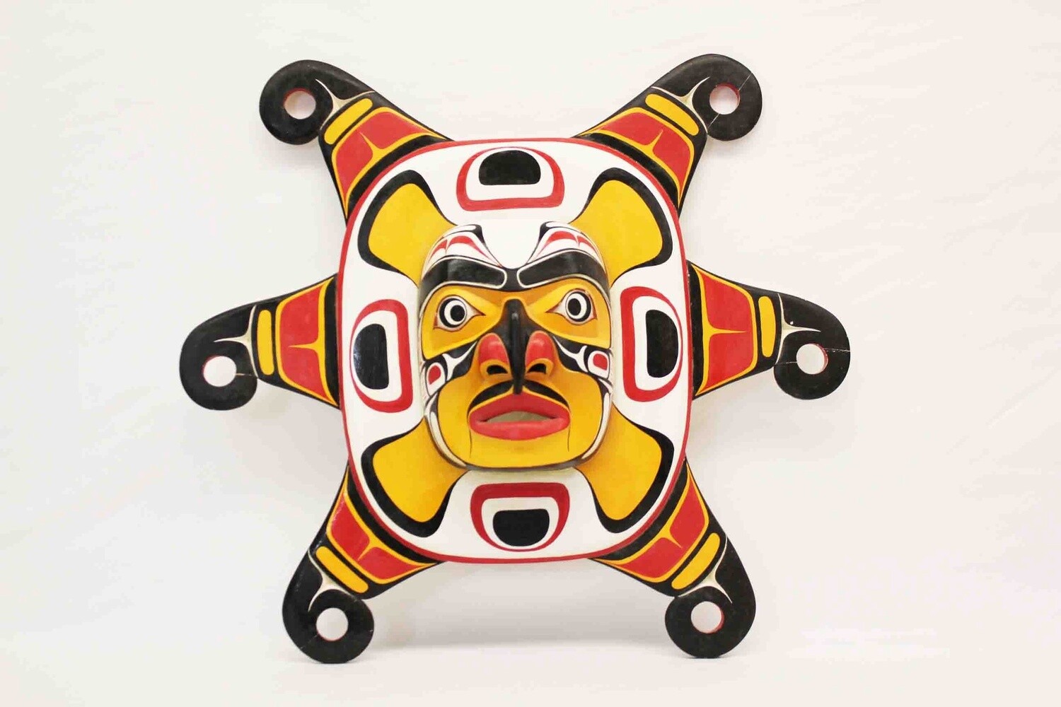 NORTHWEST INDIAN STYLE SUN MASK. HAND CARVED AND PAINTED FROM SUAR HARDWOOD. 26342
