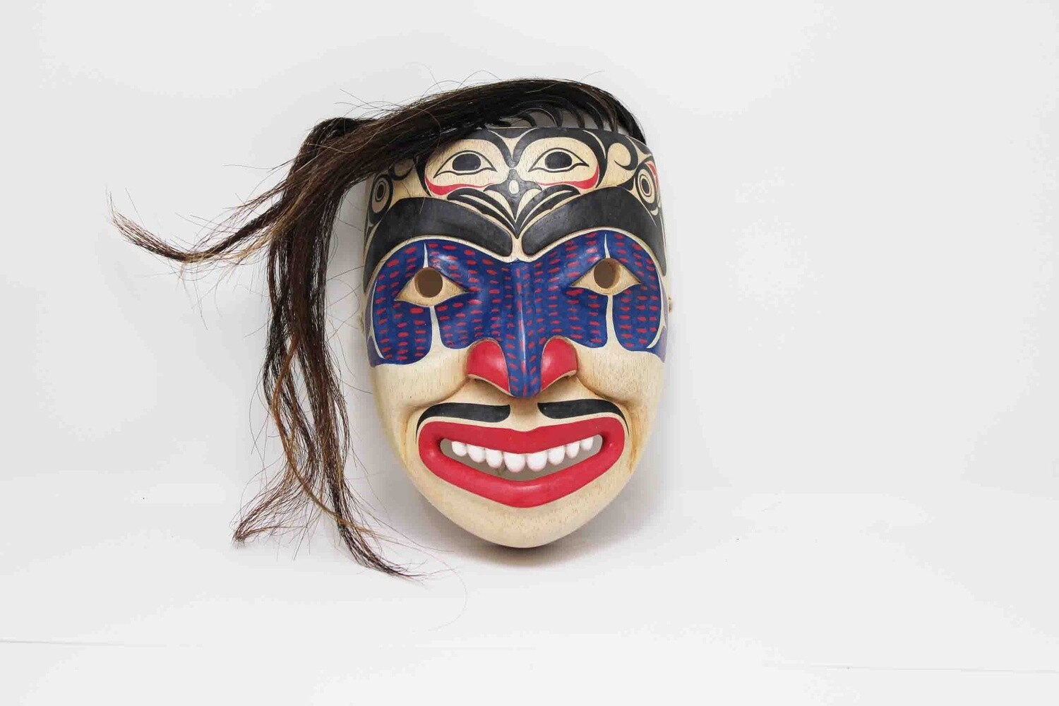 NORTHWEST INDIAN STYLE JOKER MASK WITH HAIR. HAND CARVED AND PAINTED FROM ALBESIA. 26339