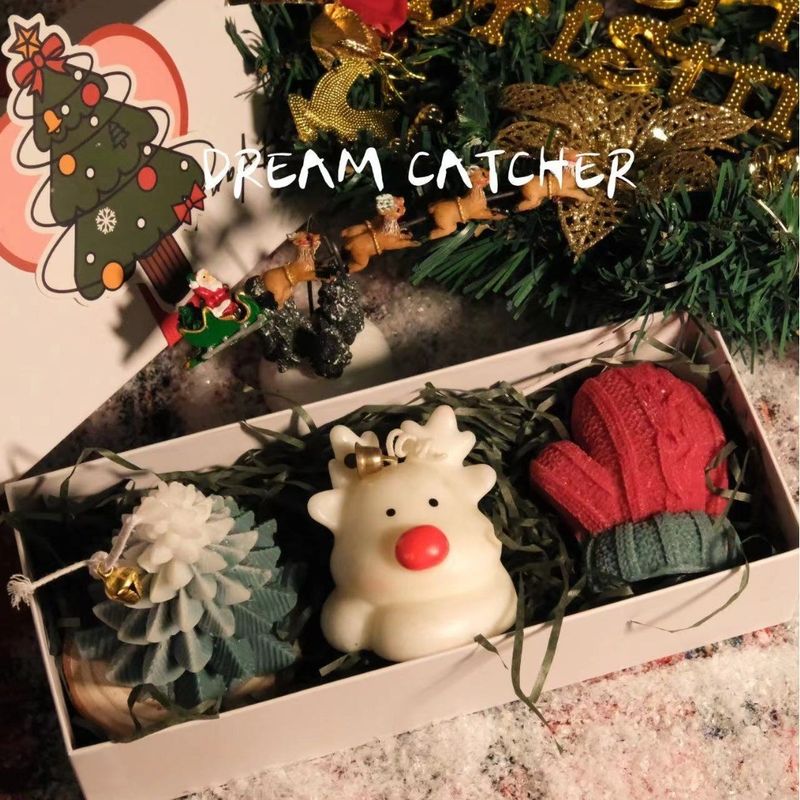 Boîte blanche de chandelles (3) de Noel (sapin, reine, mitaine)