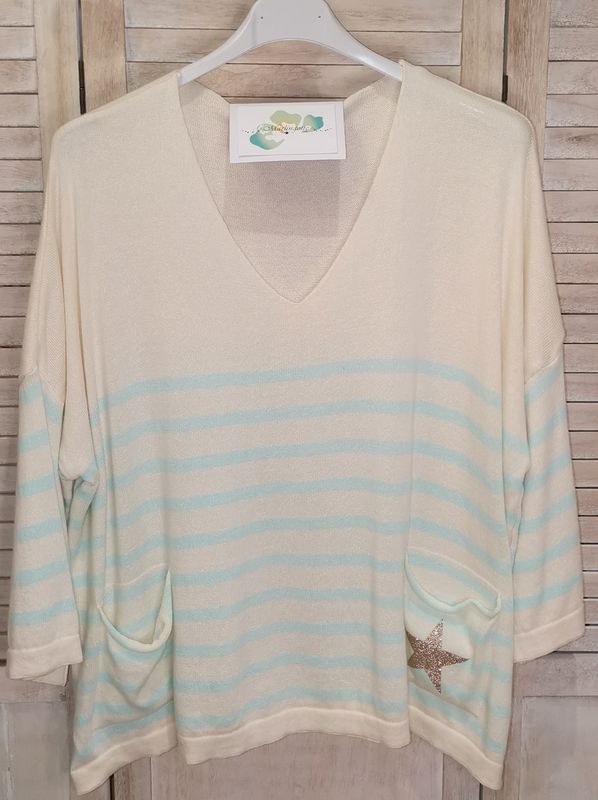 Pull beige à rayures bleues