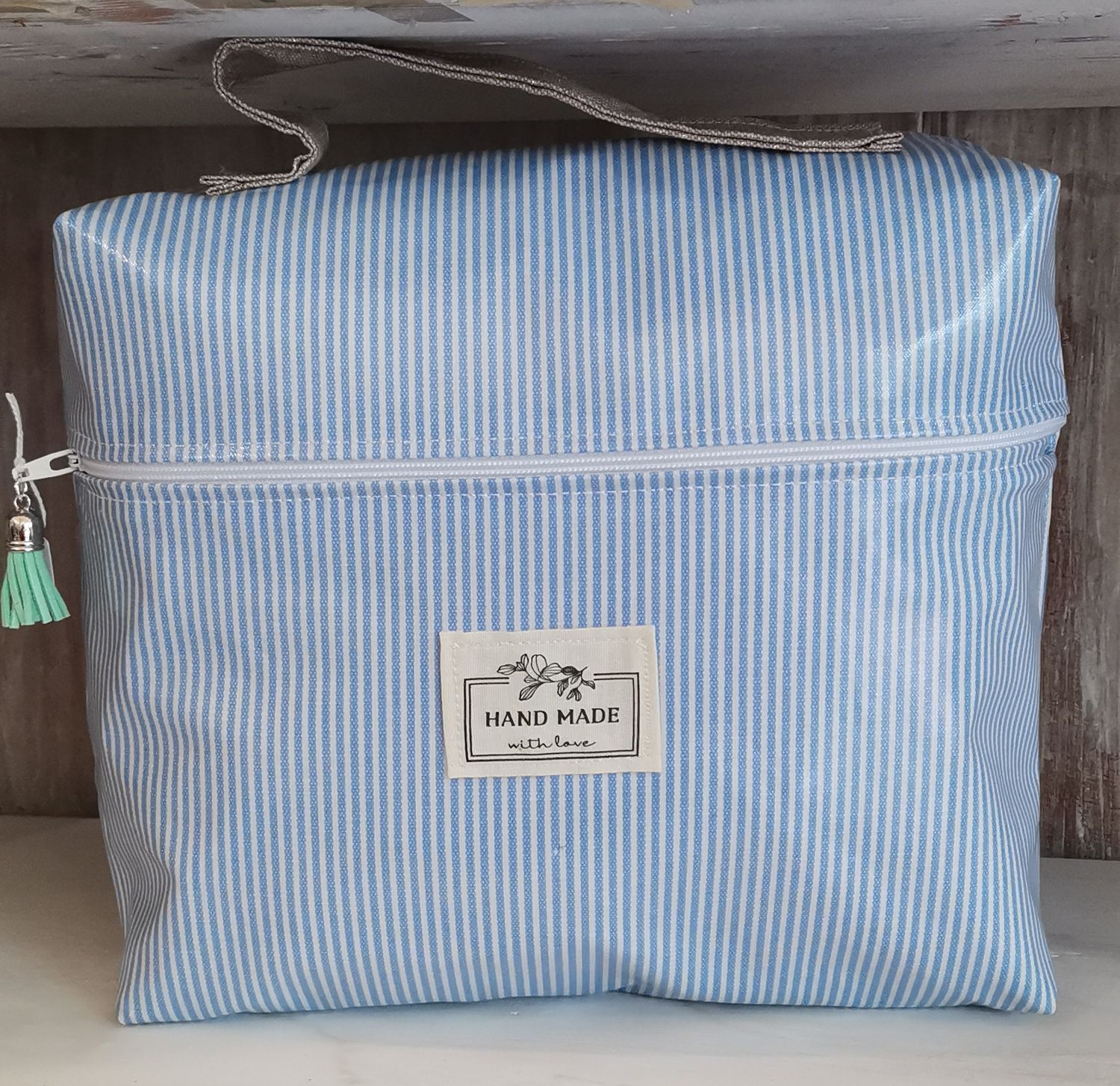 Trousse de toilette à rayures bleues et blanches