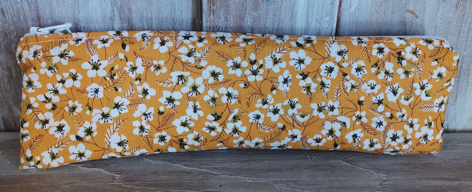 Trousse à brosse à dents jaune à fleurs blanches