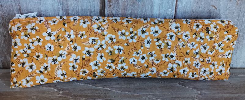 Trousse à brosse à dents jaune à fleurs blanches