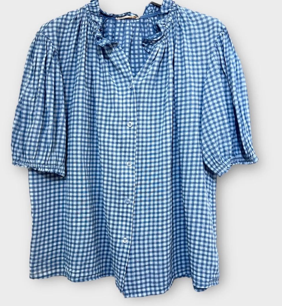 Chemise à  carreaux bleue et blanche