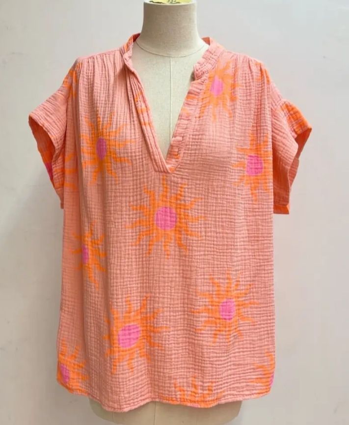 Top orange des soleils orange et rose