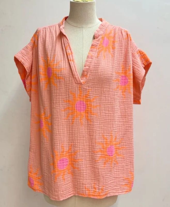 Top orange des soleils orange et rose
