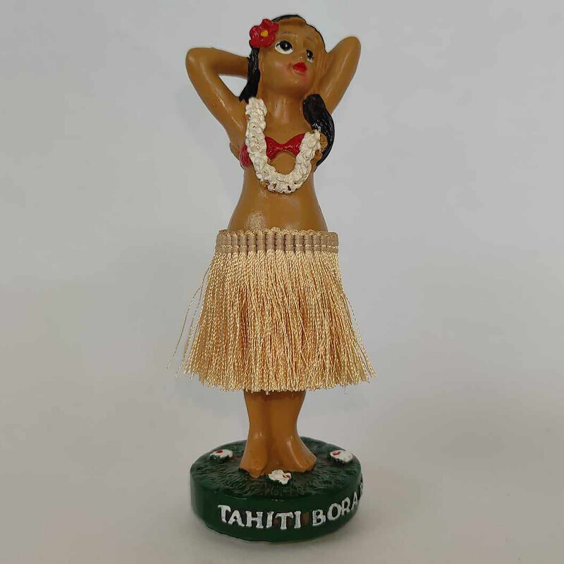 Tahitian dashboard dancer