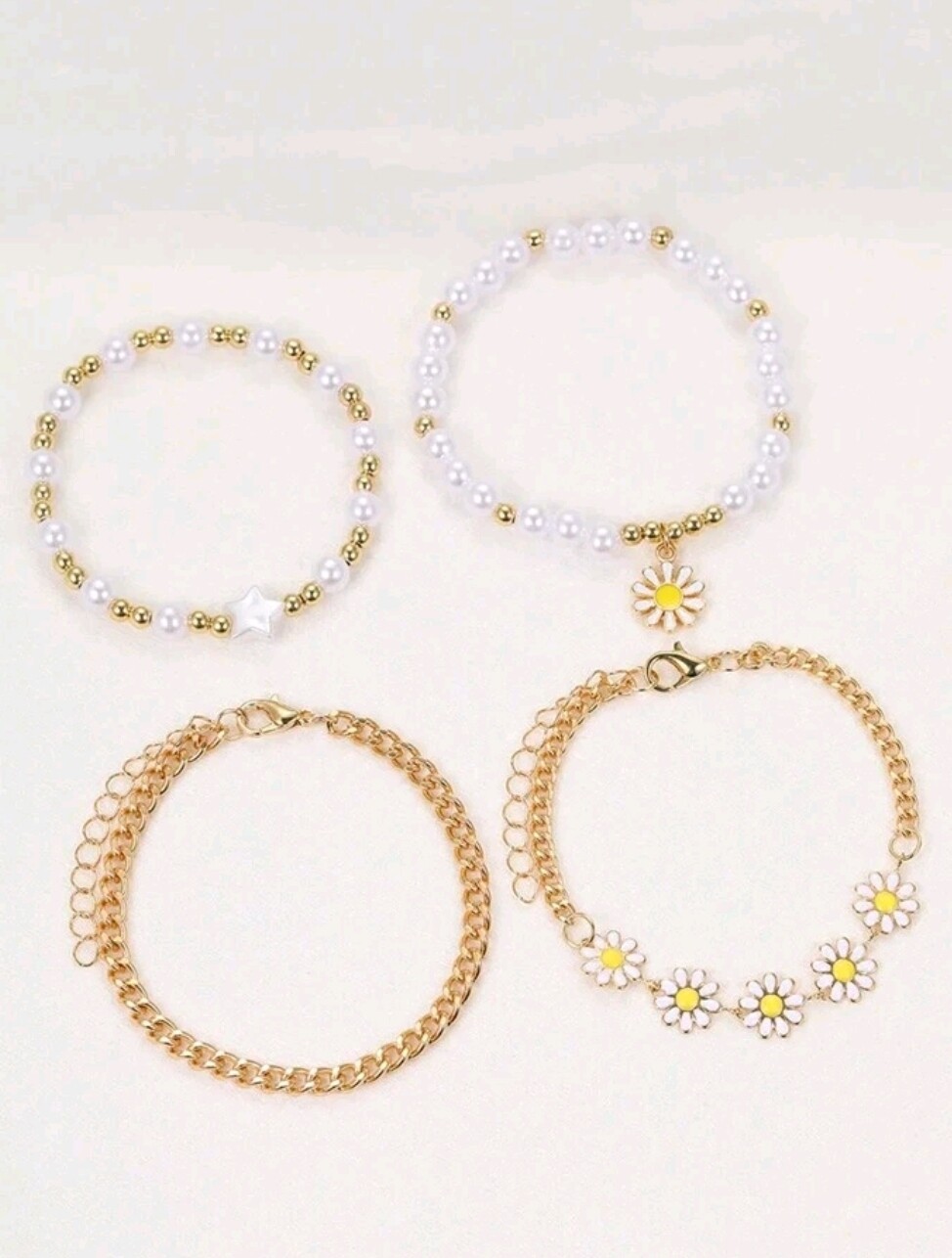 Stack of 4 floral bracelets